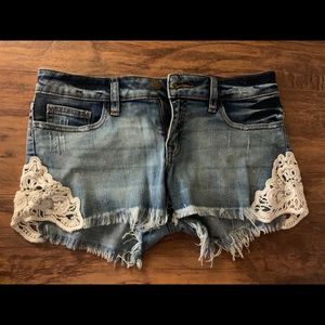 Never worn super cute jean shorts with lace
